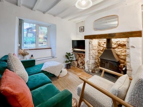 Posezení v ubytování Holly Tree Cottage