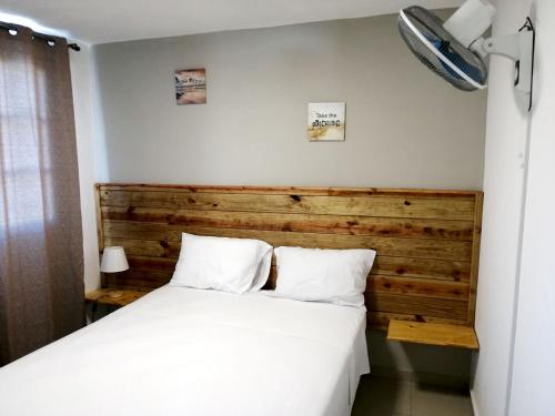 Ένα ή περισσότερα κρεβάτια σε δωμάτιο στο Hotel Yamir