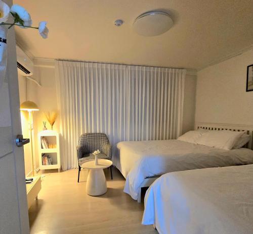 Ένα ή περισσότερα κρεβάτια σε δωμάτιο στο Rinn Stay - Bongcheon Station, Seoul National Uni, Airport Bus