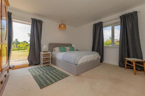 Postel nebo postele na pokoji v ubytování Fairway