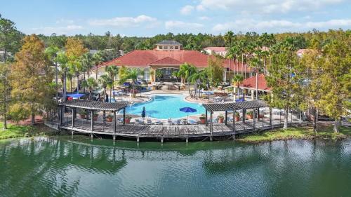 an aerial view of a resort with a swimming pool at Vacation Home near Disney World! in Kissimmee