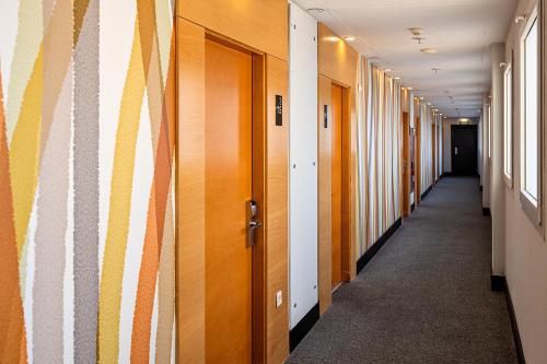 a corridor of corridors in an office building at Vértice Sevilla in Seville