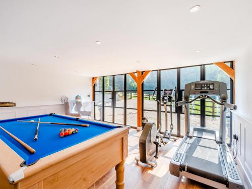 a house with a pool table and a gym at Foxton Lodge - Uk47296 in Harrietsham
