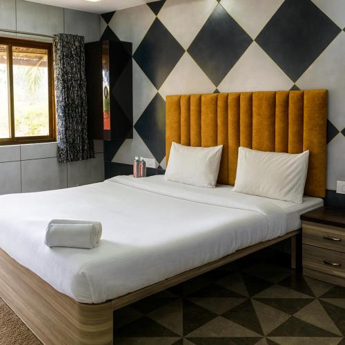 Voodi või voodid majutusasutuse River Splash Resort,Karjat toas