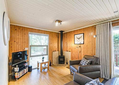 TV a/nebo společenská místnost v ubytování Springwood Lodges