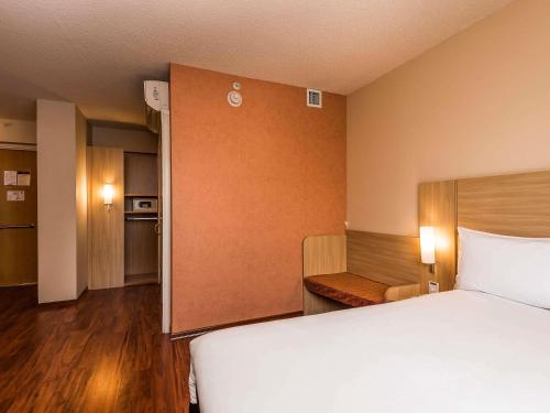 Cama o camas de una habitación en ibis Lima Larco Miraflores