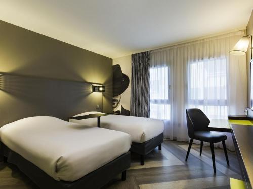 Postel nebo postele na pokoji v ubytování Ibis Styles Nice Centre Port