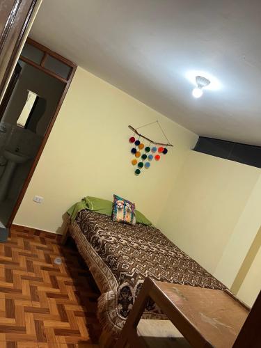 Postel nebo postele na pokoji v ubytování Hospedaje Catalina