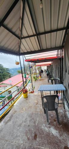 Balkón nebo terasa v ubytování Whisperingwood resort & camps