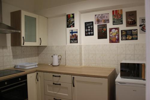 a kitchen with a counter top and a microwave at ABC Homestay in Golčŭv Jeníkov