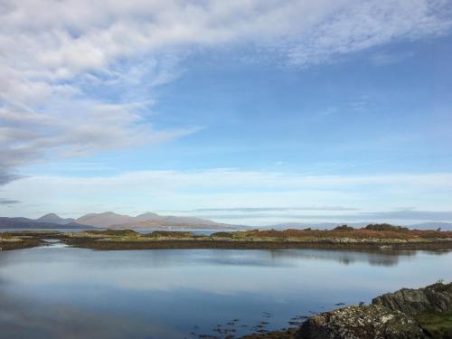 a large body of water with mountains in the background at Innish Beag - Uk38782 in Clachan