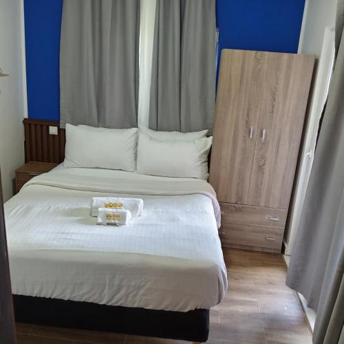 Ένα ή περισσότερα κρεβάτια σε δωμάτιο στο Comfort Corner