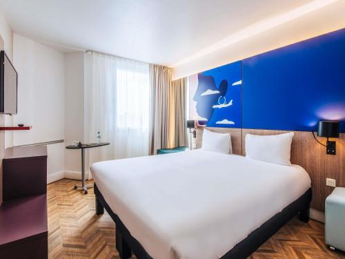 Un ou plusieurs lits dans un hébergement de l'établissement ibis Styles Nice Aéroport Arenas