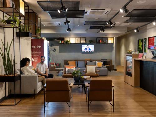 Télévision ou salle de divertissement dans l'établissement Ibis Belo Horizonte Savassi