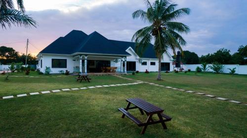 Zahrada ubytování Mwambani Beach Villas (Tanga)