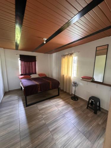 Ένα ή περισσότερα κρεβάτια σε δωμάτιο στο Maracuya Hostel