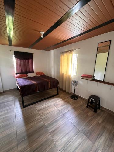 Ένα ή περισσότερα κρεβάτια σε δωμάτιο στο Maracuya Hostel