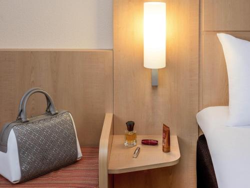 Postel nebo postele na pokoji v ubytování ibis Esch Belval