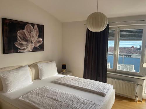Ένα ή περισσότερα κρεβάτια σε δωμάτιο στο Penthouse Seeblick