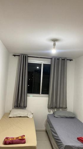 Postel nebo postele na pokoji v ubytování apartamento proximo de todos comercios