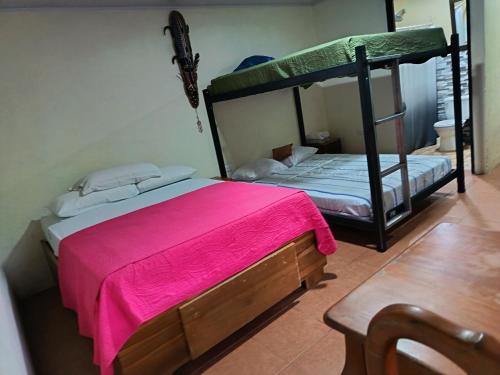 Postel nebo postele na pokoji v ubytování Villa Granja Agua Azul-wi-fi-AC-6 Personas-parqueo