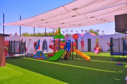 a play area with a playground with a slide at Casa Mare Resort - ex, Royal Tulip Beach Resort in Port Ghalib