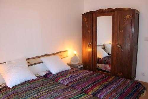 Cama o camas de una habitación en Gite Au Coeur D'Arreau
