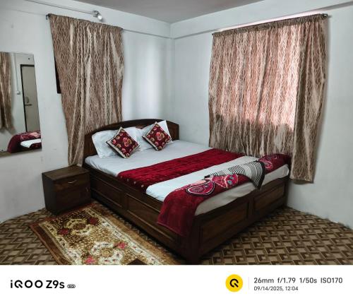 Giường trong phòng chung tại Tulip Nest Homestay