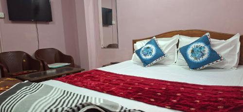 Giường trong phòng chung tại Tulip Nest Homestay