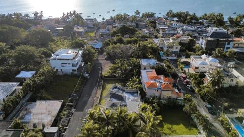 an aerial view of a city with houses at Surfers House - Garden & Views in La Gaulette