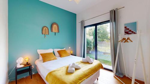 Ένα ή περισσότερα κρεβάτια σε δωμάτιο στο expat renting - Le Lumineux - Villa Design - Wi-Fi