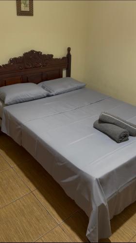 Ένα ή περισσότερα κρεβάτια σε δωμάτιο στο Apartamento em conservatória