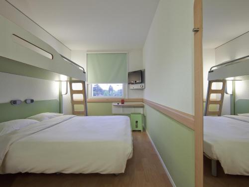Cama o camas de una habitación en ibis budget Genève Petit-Lancy