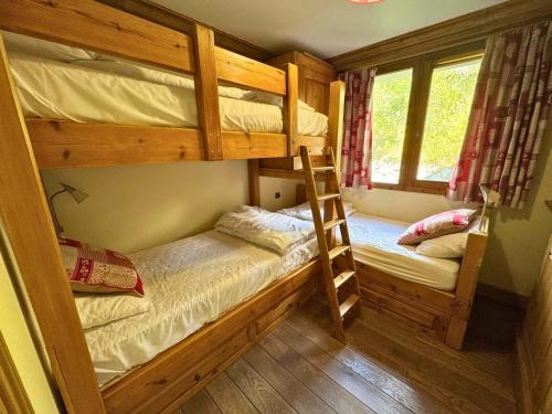 Postel nebo postele na pokoji v ubytování Appartement confortable pour 6 pers. à Saint-Martin, proche pistes, parking, WiFi - FR-1-452-395