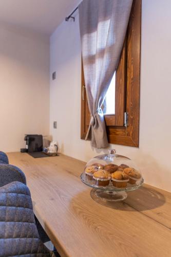 a table with two plates of pastries on it at Meteora Living Rooms in Kastrákion