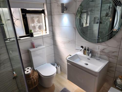 Koupelna v ubytování Le Graan Guestroom