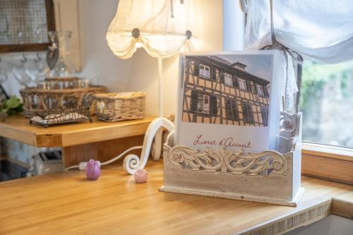 a picture of a house in a bag on a table at Loft de charme 4 étoiles confort haut de gamme garage privatif in Barr