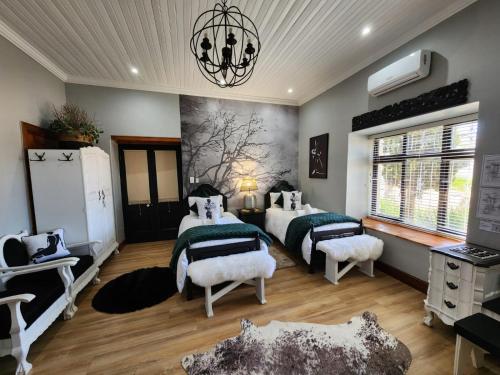 Postel nebo postele na pokoji v ubytování Le Graan Guestroom