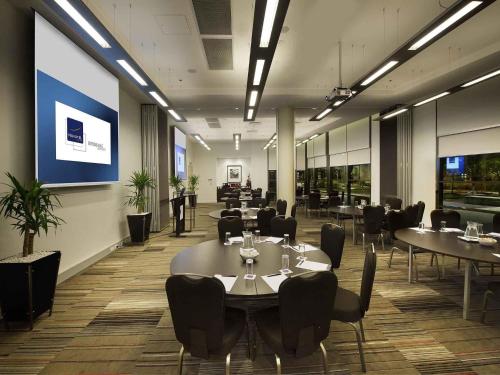 Телевизор и/или развлекательный центр в Novotel Brisbane Airport