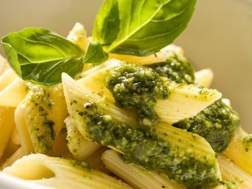 a plate of broccoli and pasta with greens on top at ibis Loriol Le Pouzin in Le Pouzin