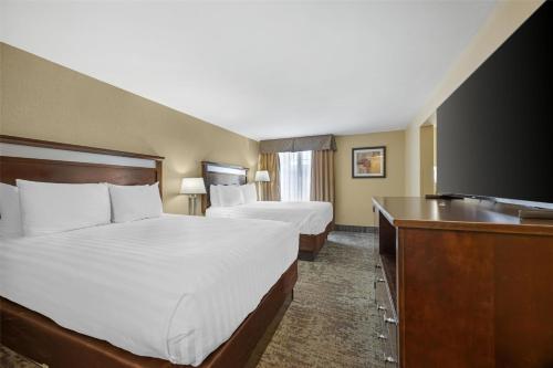 Ένα ή περισσότερα κρεβάτια σε δωμάτιο στο Best Western Plus Prairie Inn