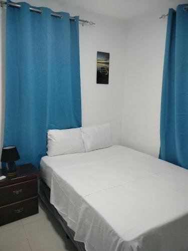 Ένα ή περισσότερα κρεβάτια σε δωμάτιο στο Hotel Yamir