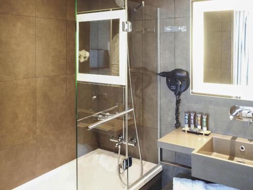Salle de bains dans l'établissement Novotel SPA Rennes Centre Gare