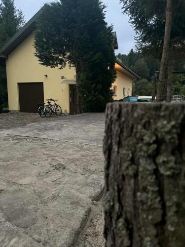 a group of bikes parked in front of a building at Zacisze Nad Stawami 