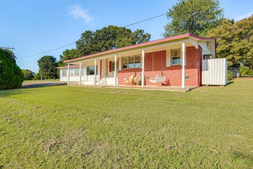a red brick house with a large yard at Walk to Marina Family Home with Yard in Kingston in Shay