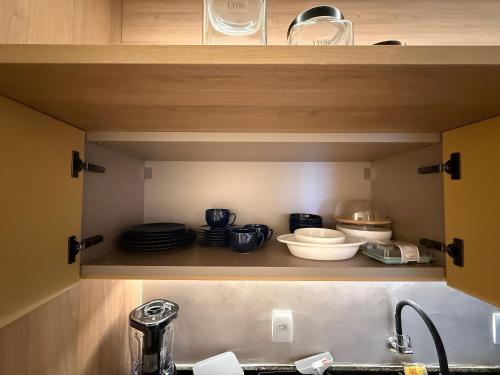 Η κουζίνα ή μικρή κουζίνα στο Studio Design 3 Apt 913 -Mandi Hospitalidade