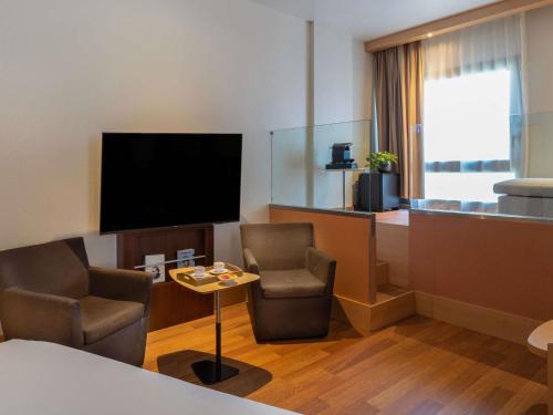 TV o dispositivi per l'intrattenimento presso Ibis Madrid Centro las Ventas