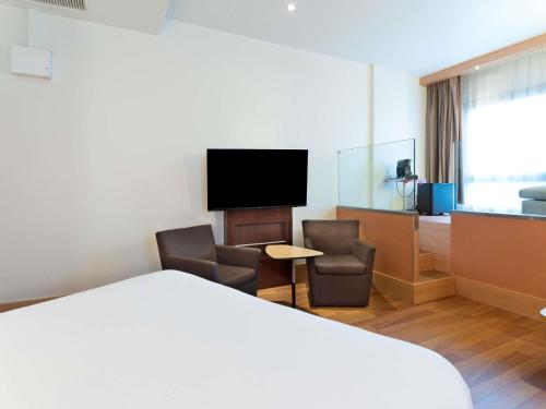 TV o dispositivi per l'intrattenimento presso Ibis Madrid Centro las Ventas