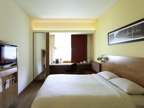 Cama o camas de una habitación en ibis Bengaluru Outer Ring Road