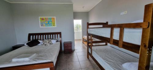 Postel nebo postele na pokoji v ubytování Casa Praiana